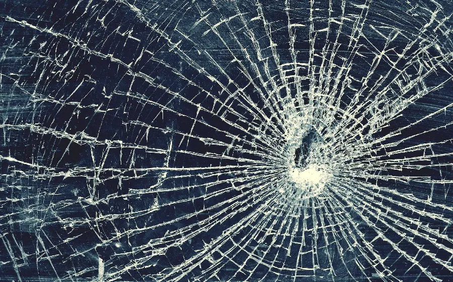 Spectacular background of cracked glass for the computer in full hd quality