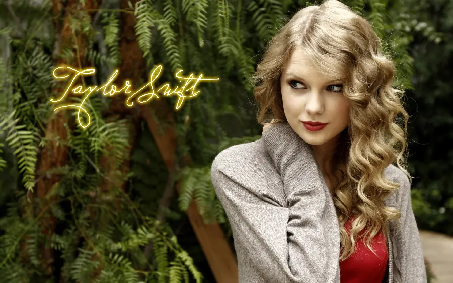 Old photo of Taylor Swift in nature with golden curly hair