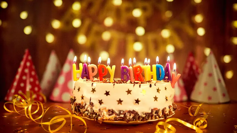 The most famous birthday cake photo with beautiful Happy Birthday candle 