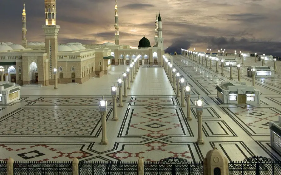 HD wallpaper of the Medina Mosque with illuminated corridors