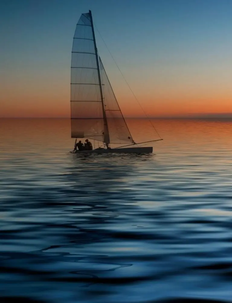 Eye-catching Background Of A Sailing Boat At Sunset For Your Phone