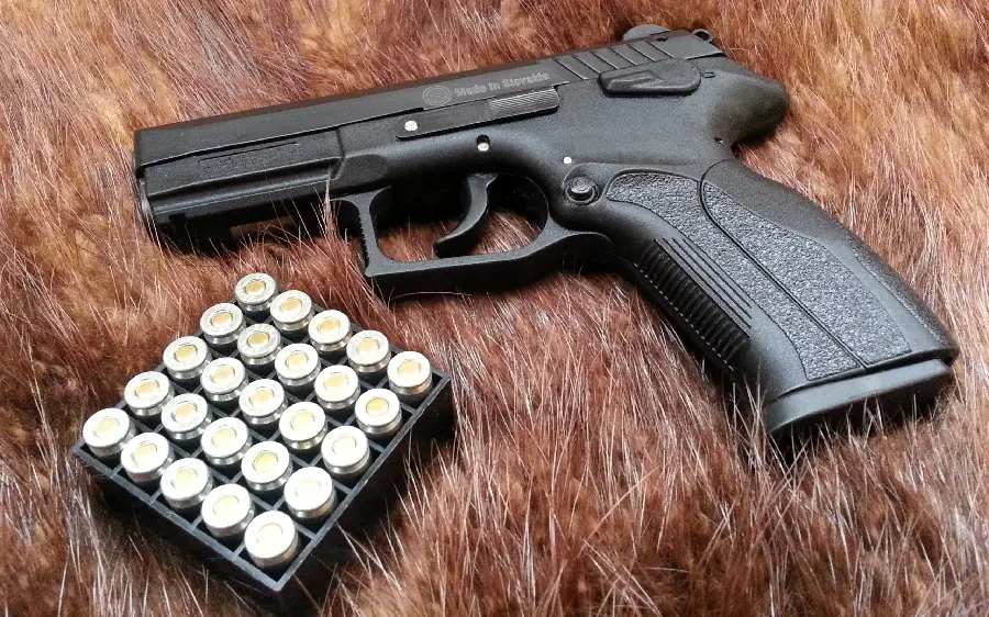Download High Quality Gun and Bullet Stock Photos