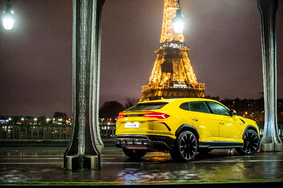 Lamborghini SUV with Eiffel Tower view