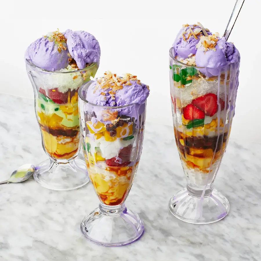 Download Wallpaper of a cool summer glass dessert containing fruit and ice cream