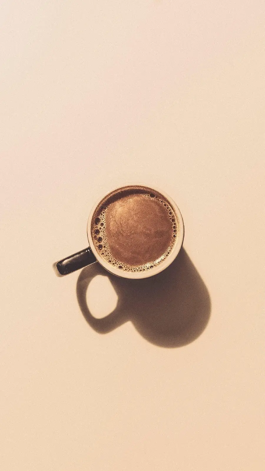 Lovely background of coffee cup with stylish cream background