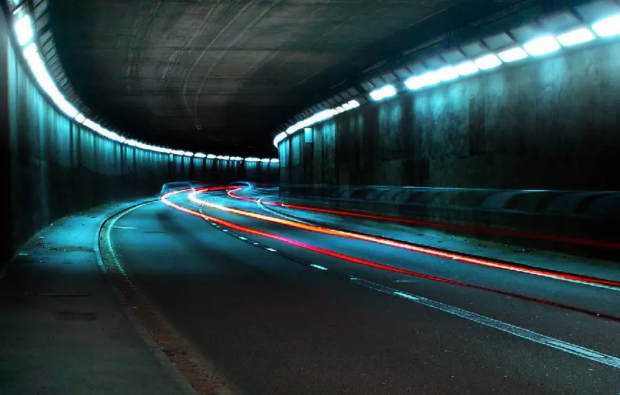 Interesting picture of a modern underground tunnel with dreamy colored lights