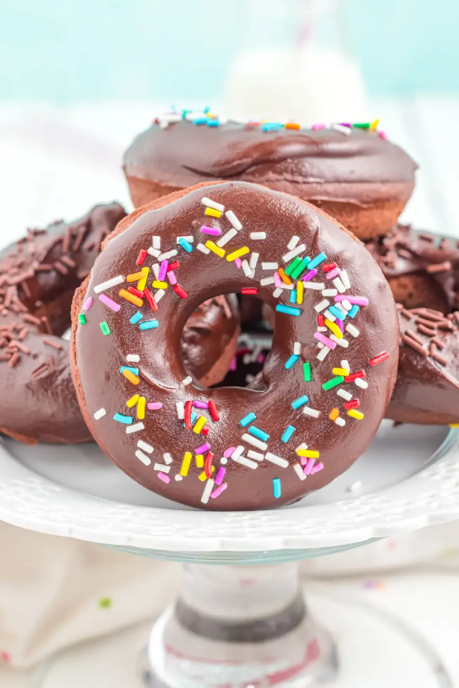 Image of delicious fantasy chocolate donuts with colored truffles