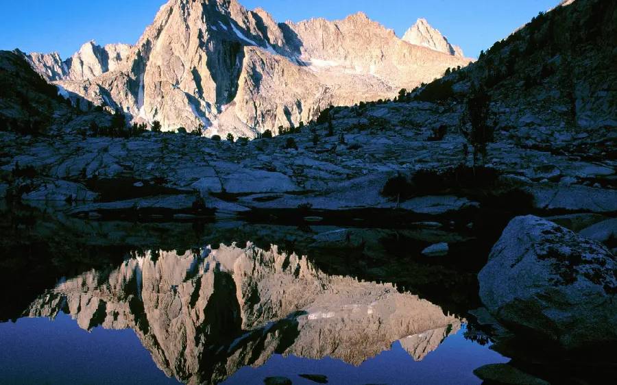 4K image of the reflection of the pristine nature of the mountains in the lake