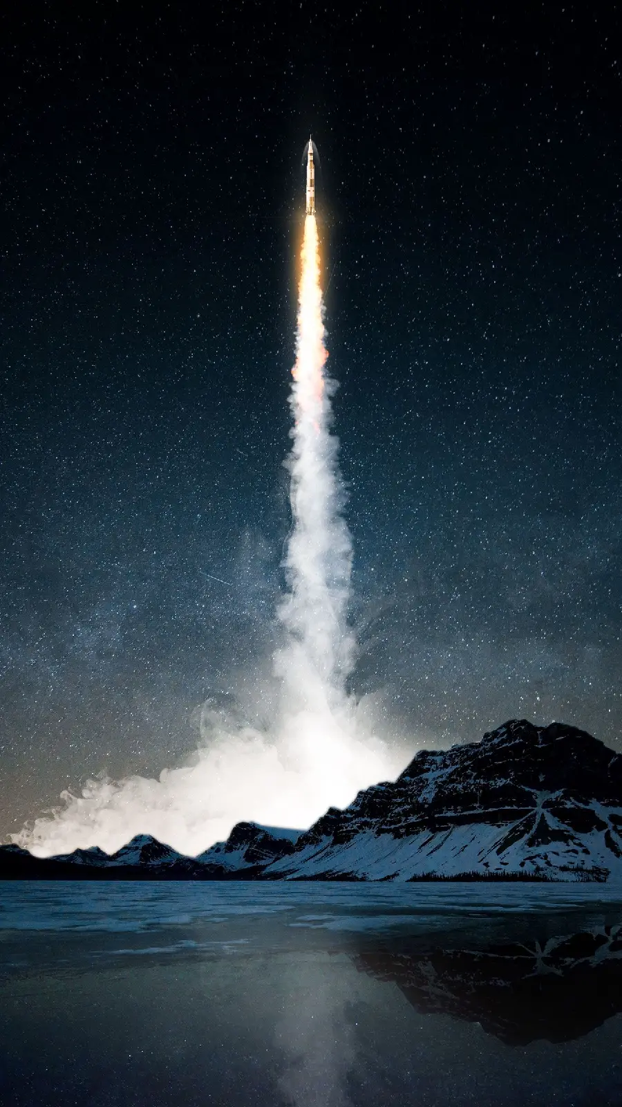 Interesting and spectacular photo of Space rocket next to a high, snowy mountain 