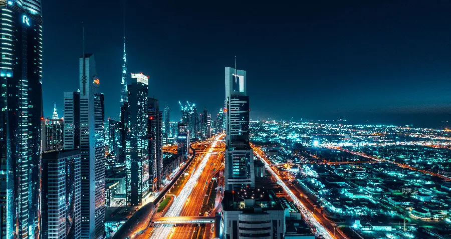 Dreamy background of the sophisticated city of Dubai at night for desktop