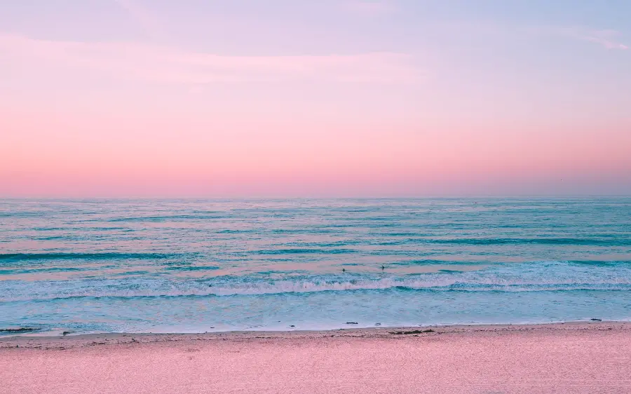 Spectacular view of the blue sea under a suitable pink sky Story 