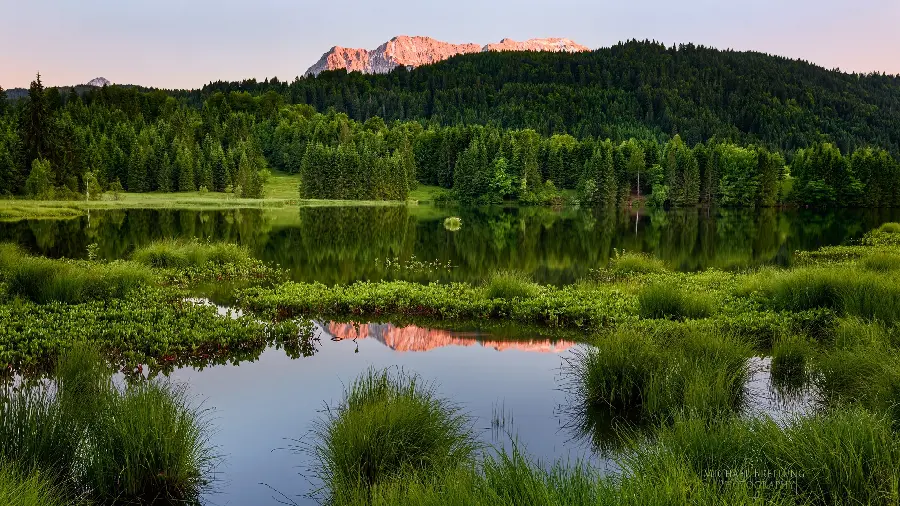 Full hd image of the attractive reflection of green nature in the water for printing