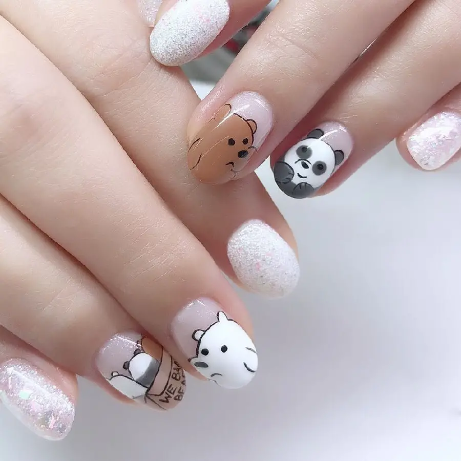 Cute and fantasy gel nail art with a hazelnut bear design