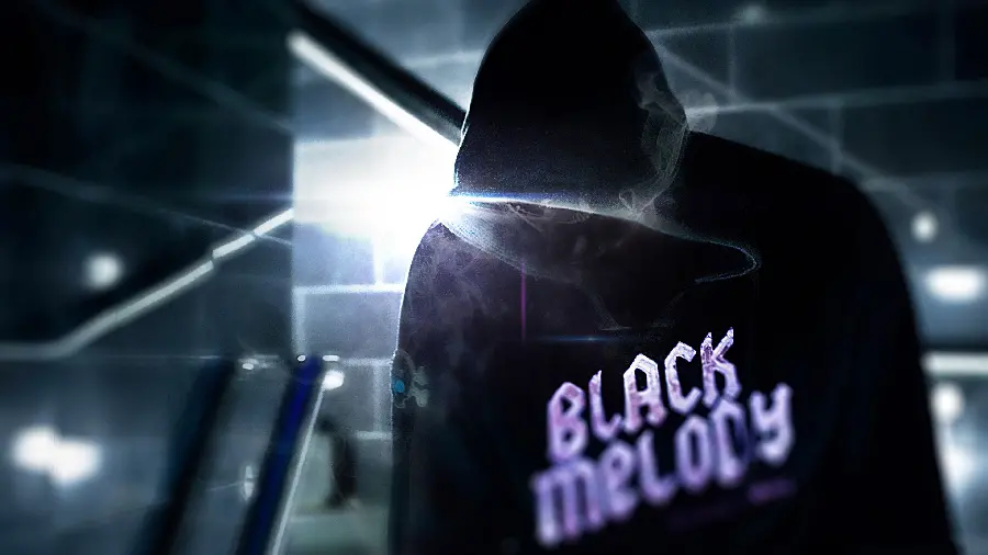 Download wallpaper of a boy With a special Black Melody hoodie