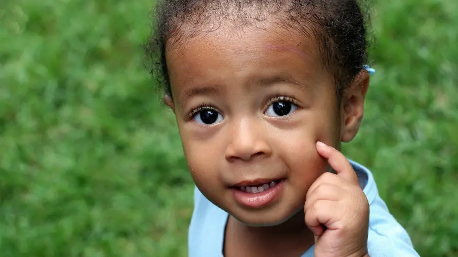 Photo of a beautiful black boy with salt