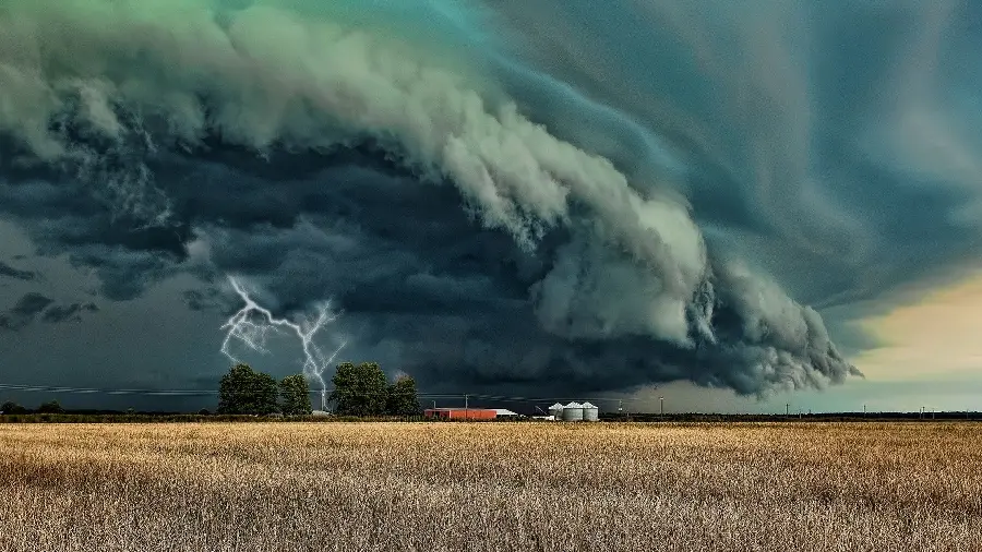 Attractive image of a very large tornado and lightning at the same time