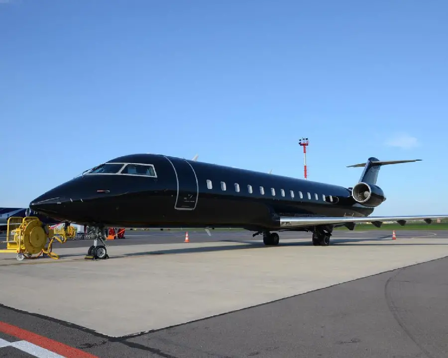 Photo of a private plane with a dark black color