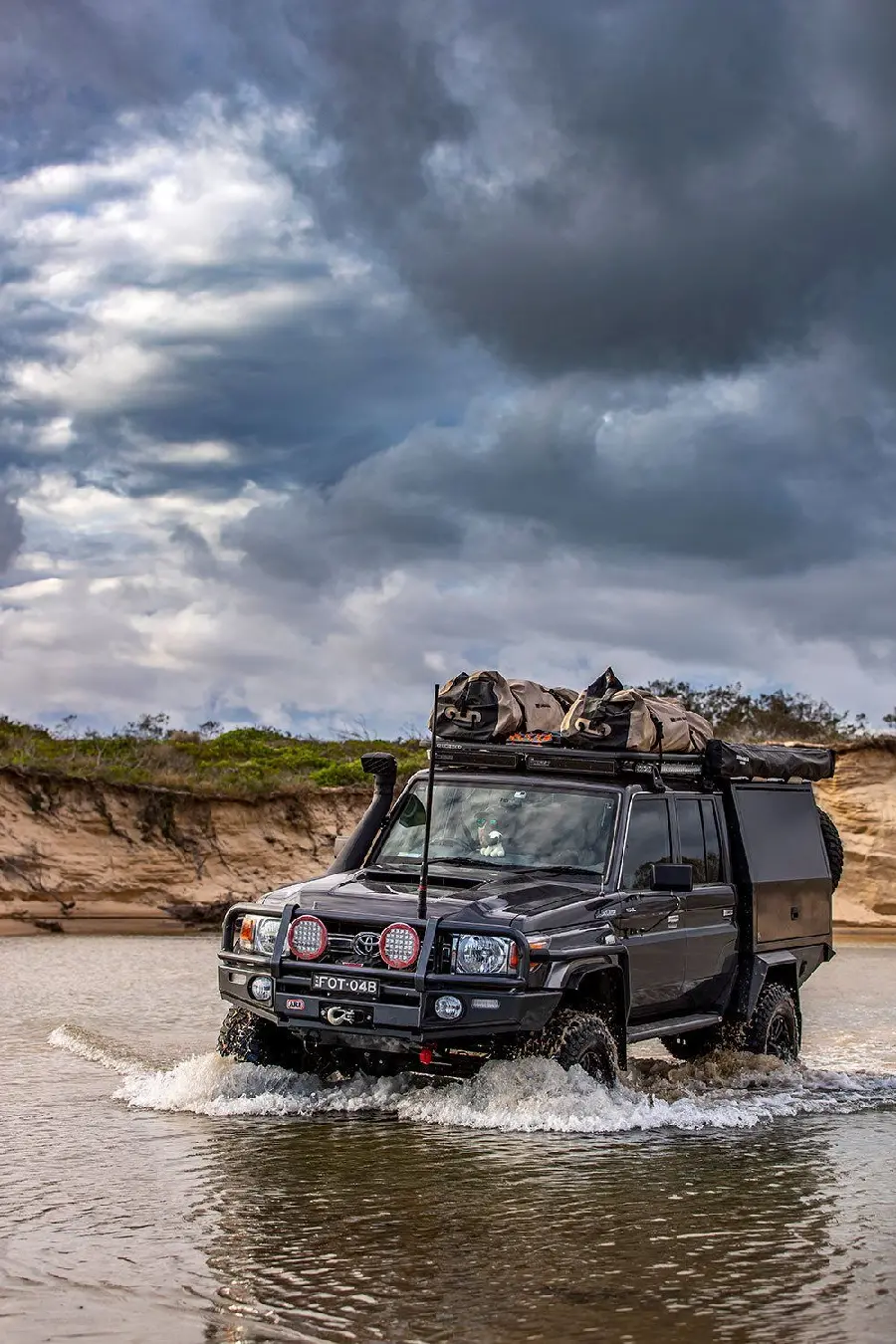 Offroad Photo in Water with Toyota Land Cruiser 70 Double Cab