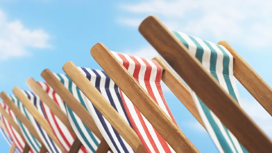 Download energizing wallpaper with the subject of folding beach chairs