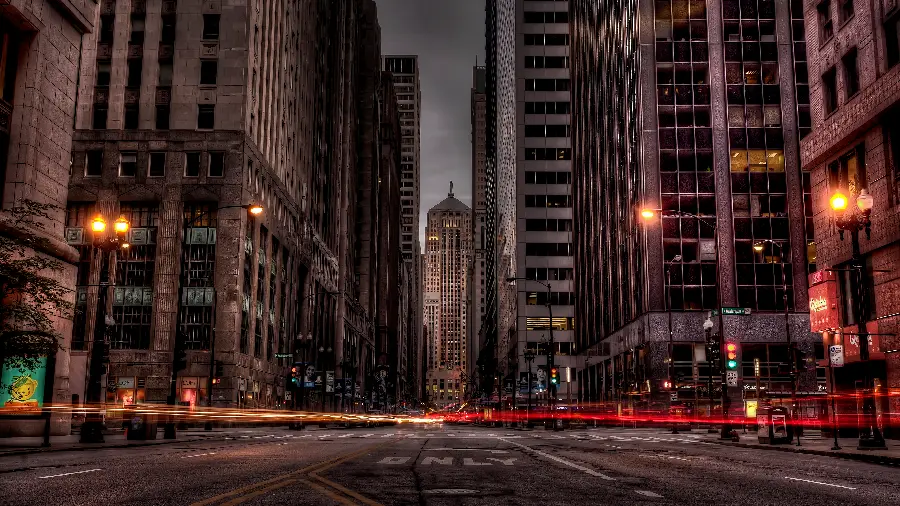 Photo of a dark and deserted street with tall and stylish buildings for wallpaper