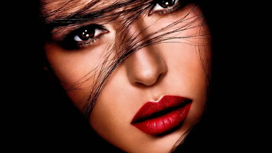 The most attractive Full HD wallpaper of a black-haired girl with red lipstick for a laptop