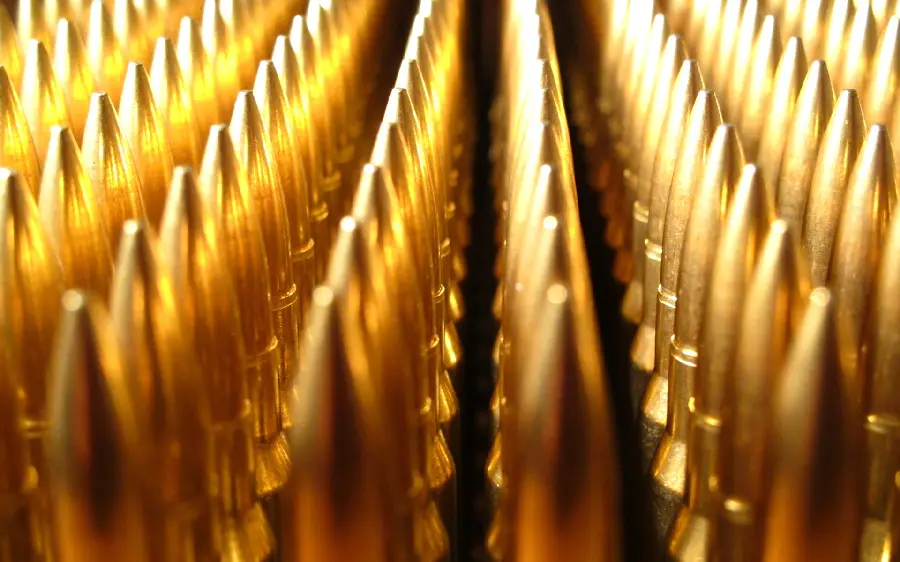 High Quality Photos of Golden Guns and Rifles and Bullets in jpg Format