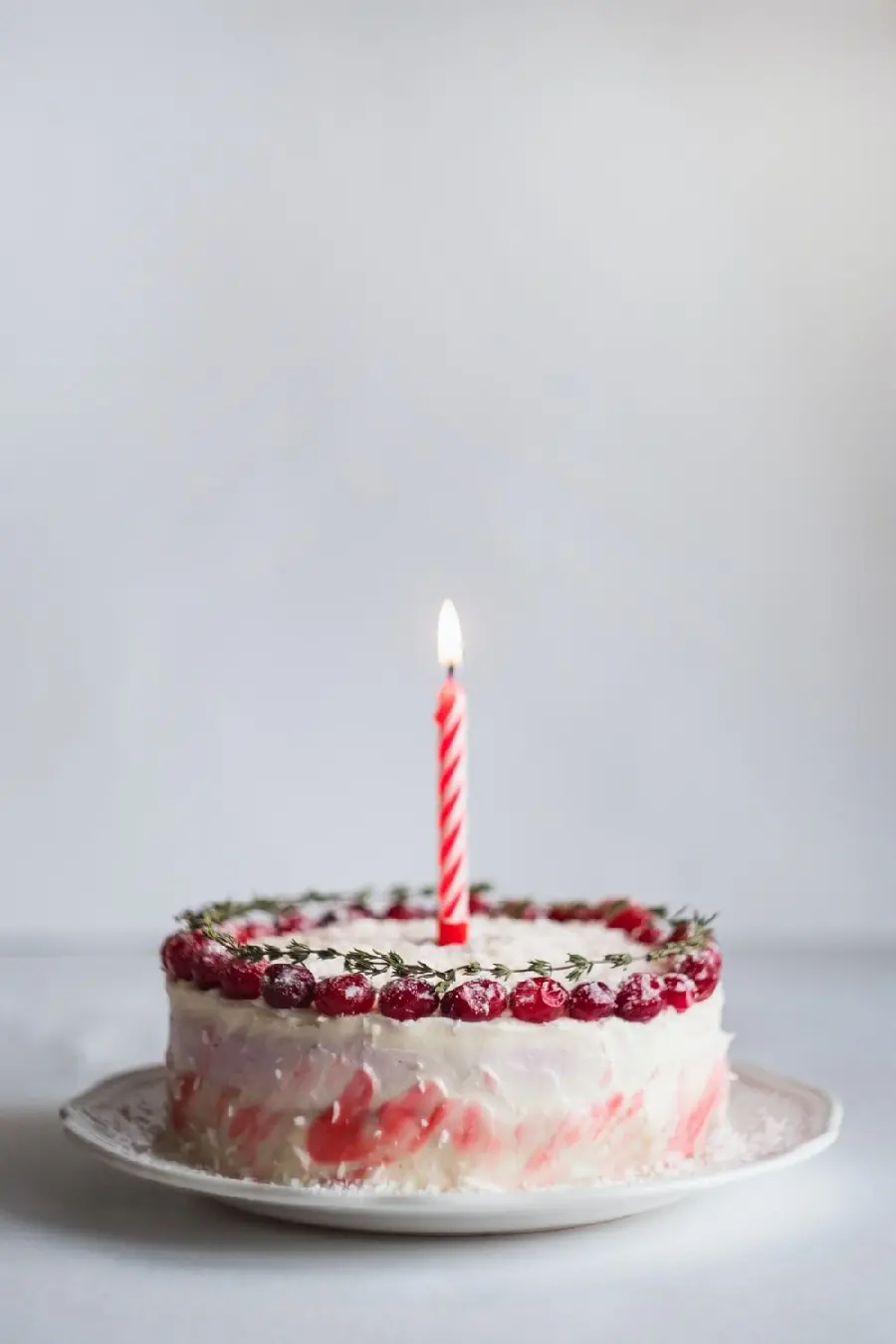 Simple Birthday Cake Photo with a Lighted Candle for Instagram