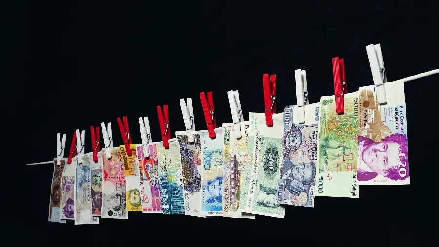 Wallpaper of Banknotes Hanging from a Clothesline in 4k Quality