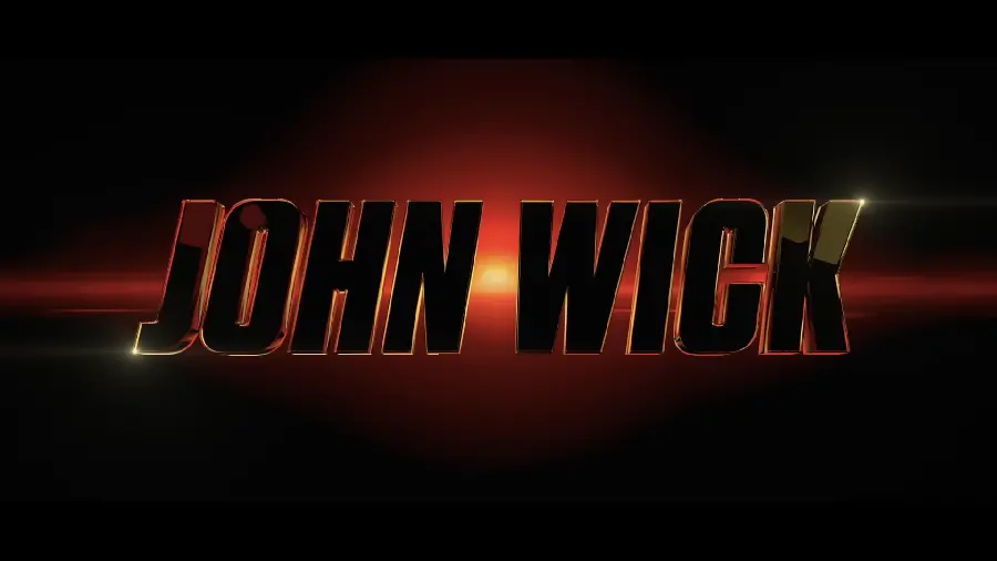 Stylish John Wick poster with gold font and dark background