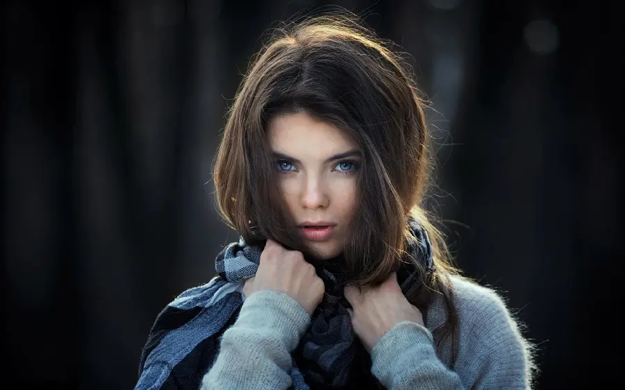 Attractive girl with blue eyes in winter wallpaper