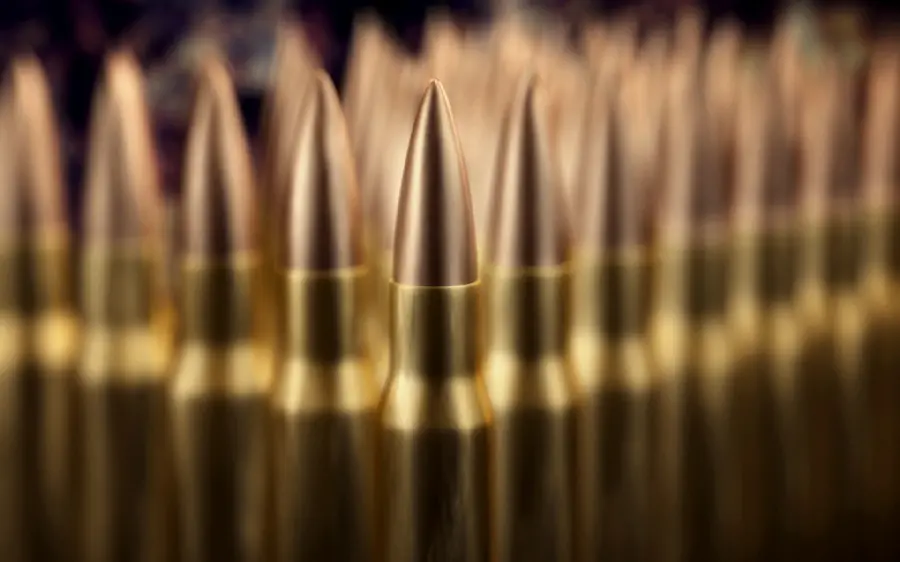 High-quality photo of golden bullets and war bullets