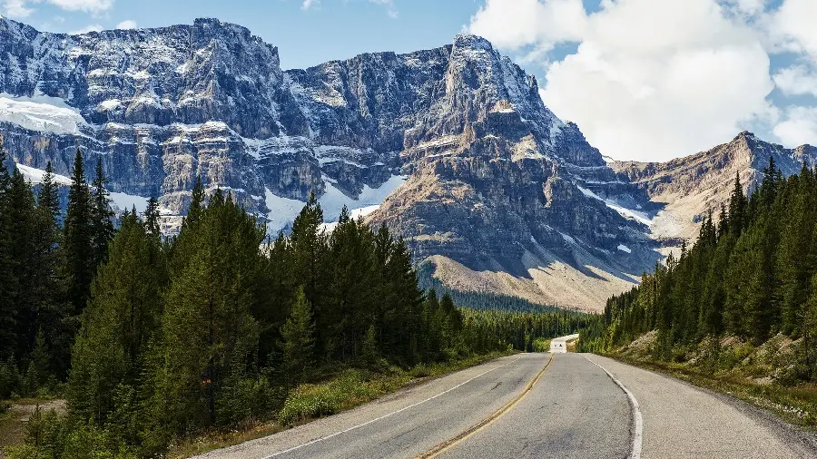 Soothing view of a deserted road with a snowy landscape
