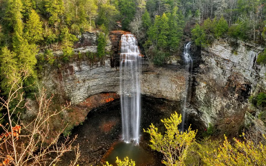 A picture of a small waterfall on a river in pristine and beautiful nature