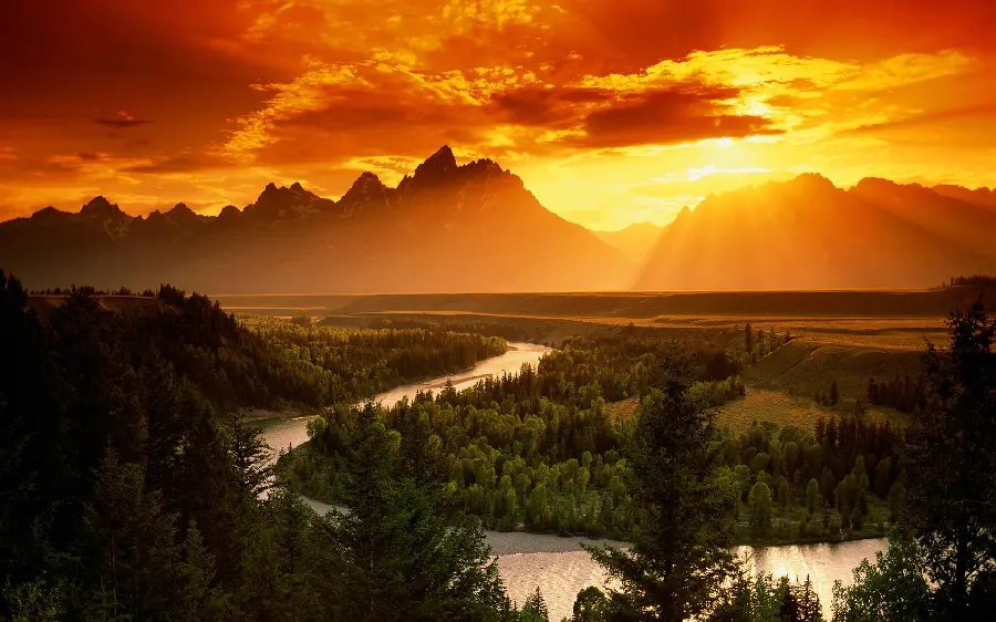 Magical full hd background of sunset over the expanse of the forest and the beautiful river
