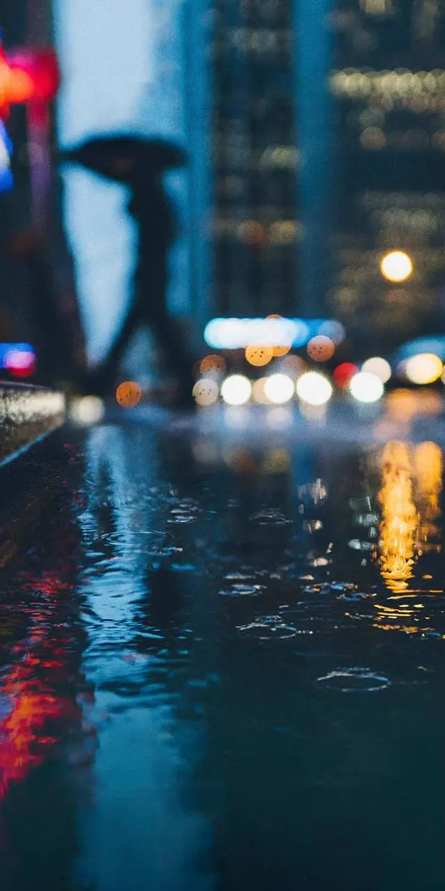 Dreamy Rainy City Wallpaper at Night for Story and Phone Background