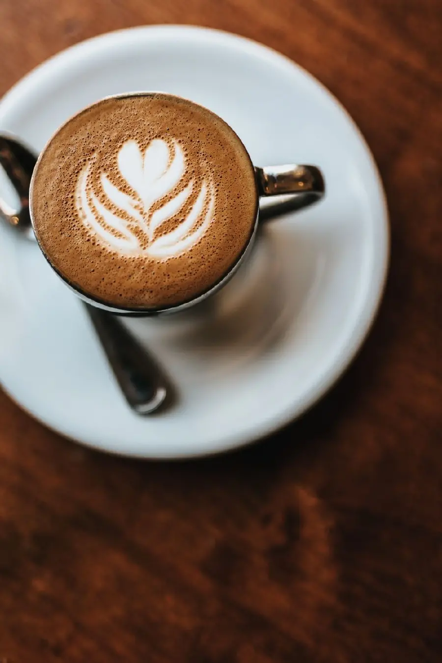 Beautiful coffee cup in a cafe for a romantic WhatsApp profile
