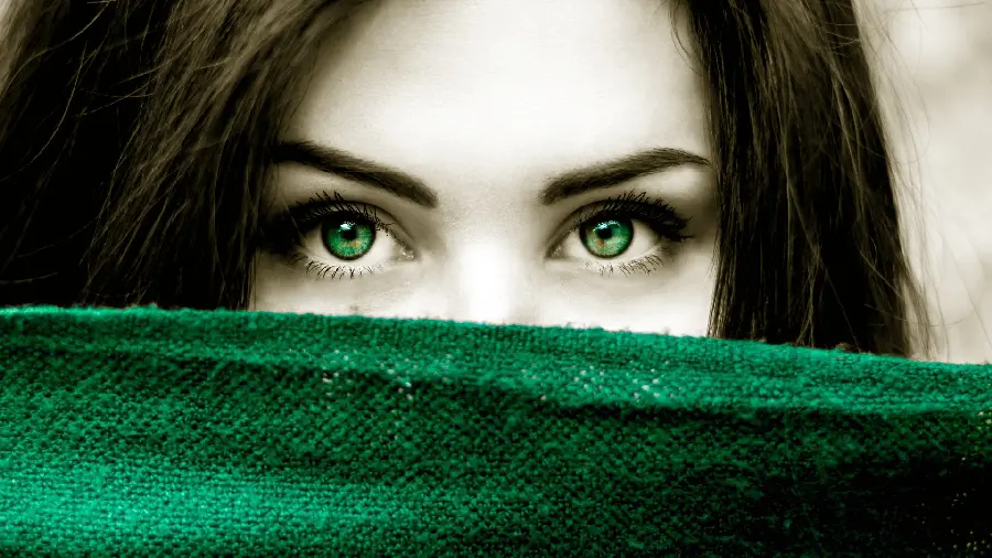 Black hair girl's profile with green eyes and a green scarf set in HD quality
