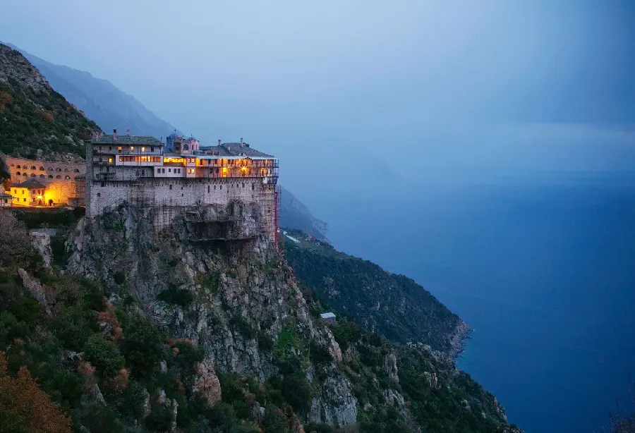 Interesting image of a temple with bright rooms in the heart of the Tibetan mountains