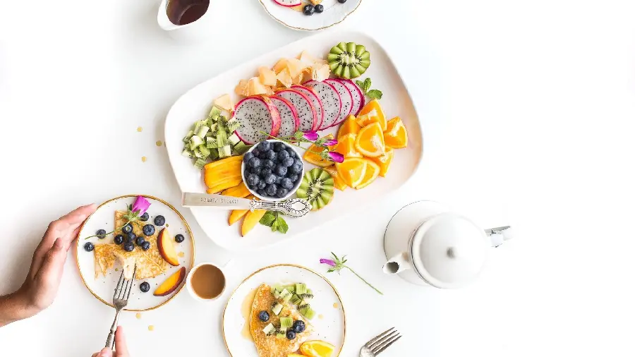 A healthy breakfast photo with a variety of delicious tropical fruits