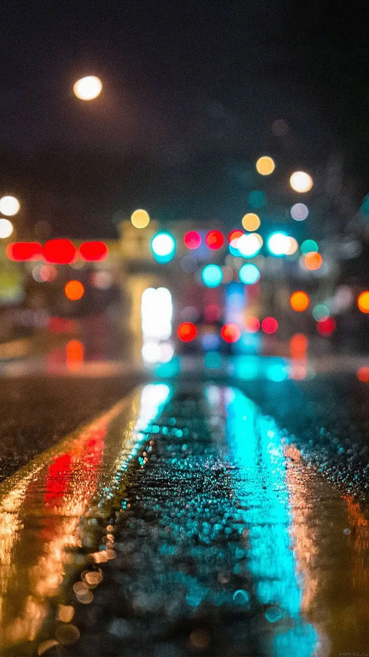 Download stylish IOS mobile wallpaper with a spectacular street and night design