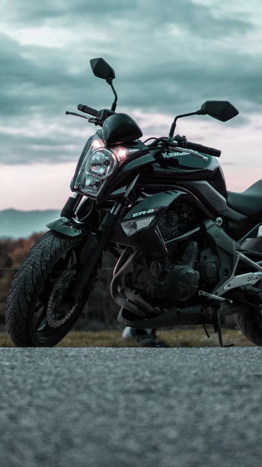 Black motorcycle and road photo