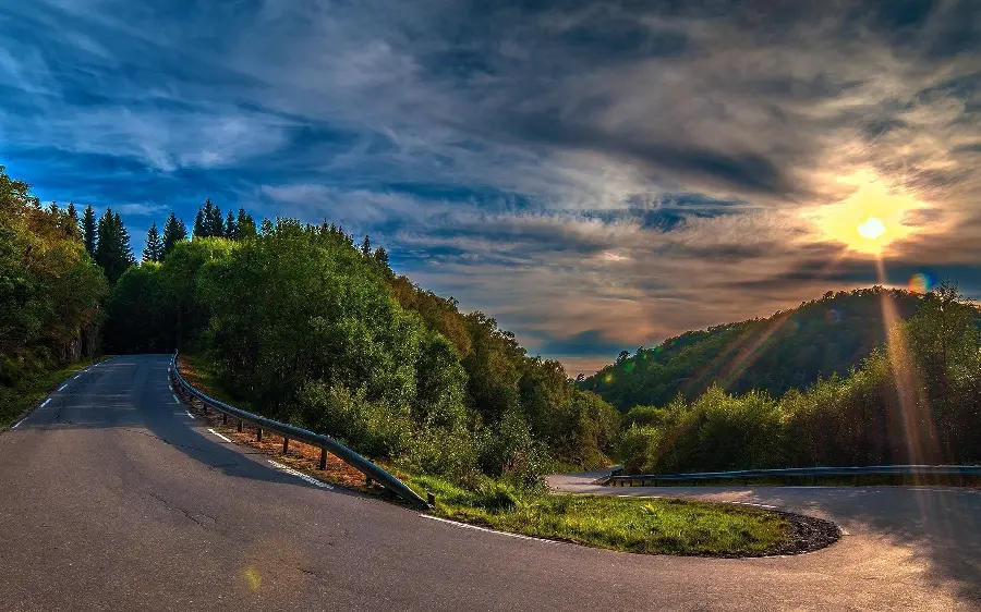 Full hd background of a dreamy spiral road in the heart of nature for laptops