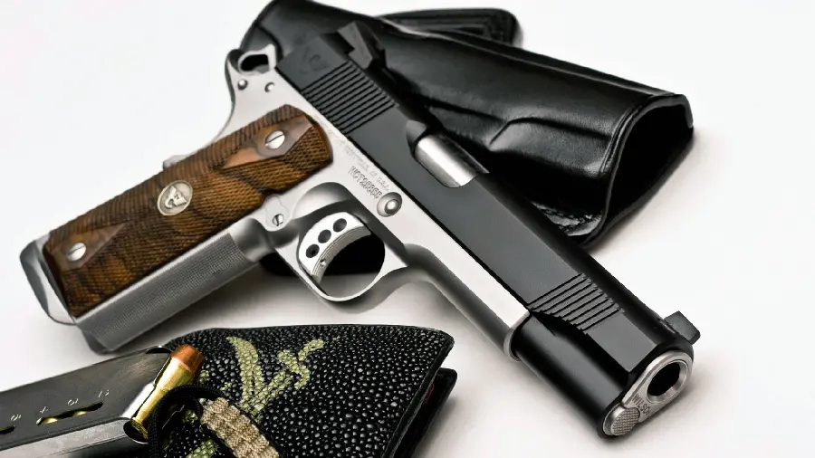 High-quality photo of a black rifle and colt with a white background