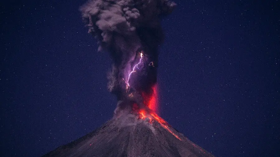 Fantasy profile photo of a volcano eruption and a beautiful night sky