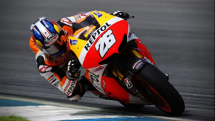 Photo of dramatic movement with a racing motorcycle