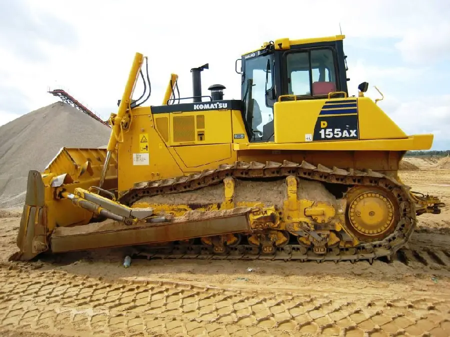 Photo of the side of a large bulldozer in the workshop