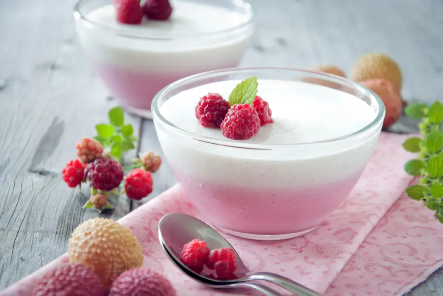 Beautiful photo of a white and pink glass dessert for an evening