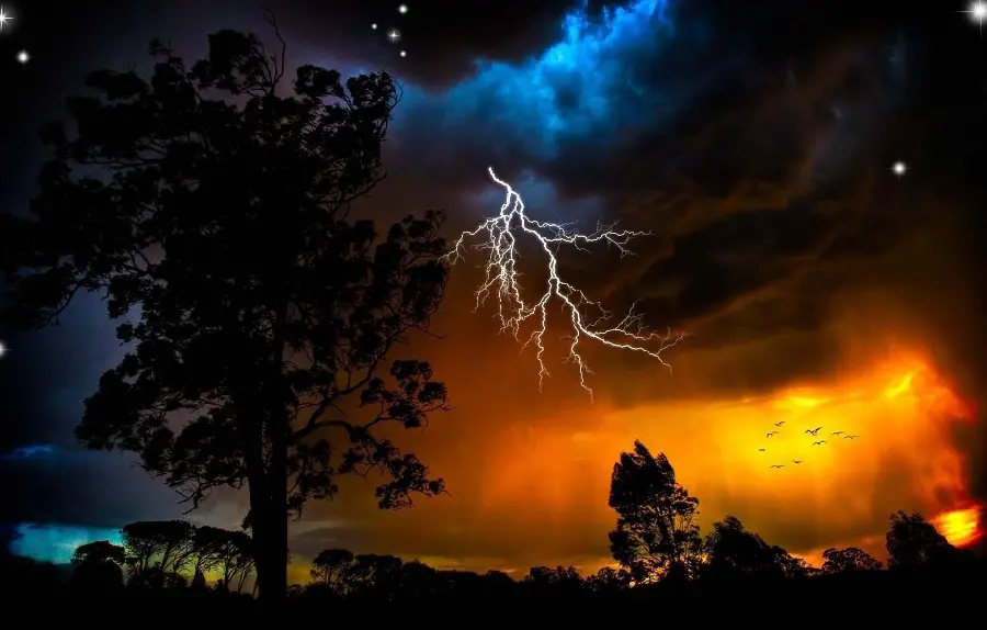 Interesting picture of lightning with sunset and a beautiful tree there