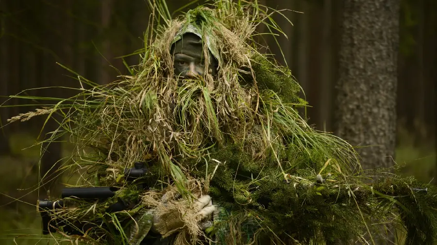 Very Cool Picture of Soldier Camouflage with Plants in the Forest