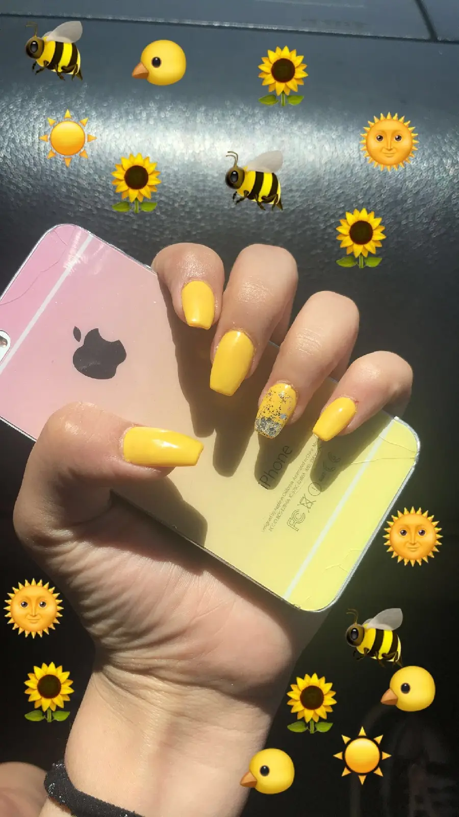 Photo of luxurious yellow nails and an iPhone suitable for stories